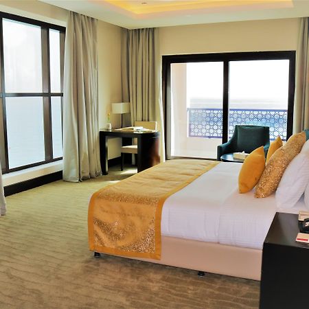 Al Bahar Hotel & Resort Fujairah Exterior photo A bedroom at the hotel