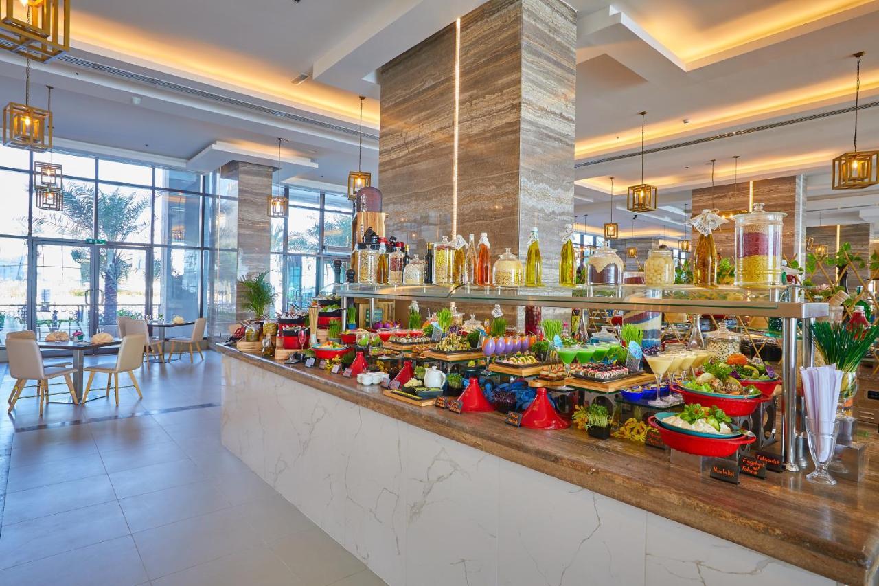 Al Bahar Hotel & Resort Fujairah Exterior photo The buffet at the hotel