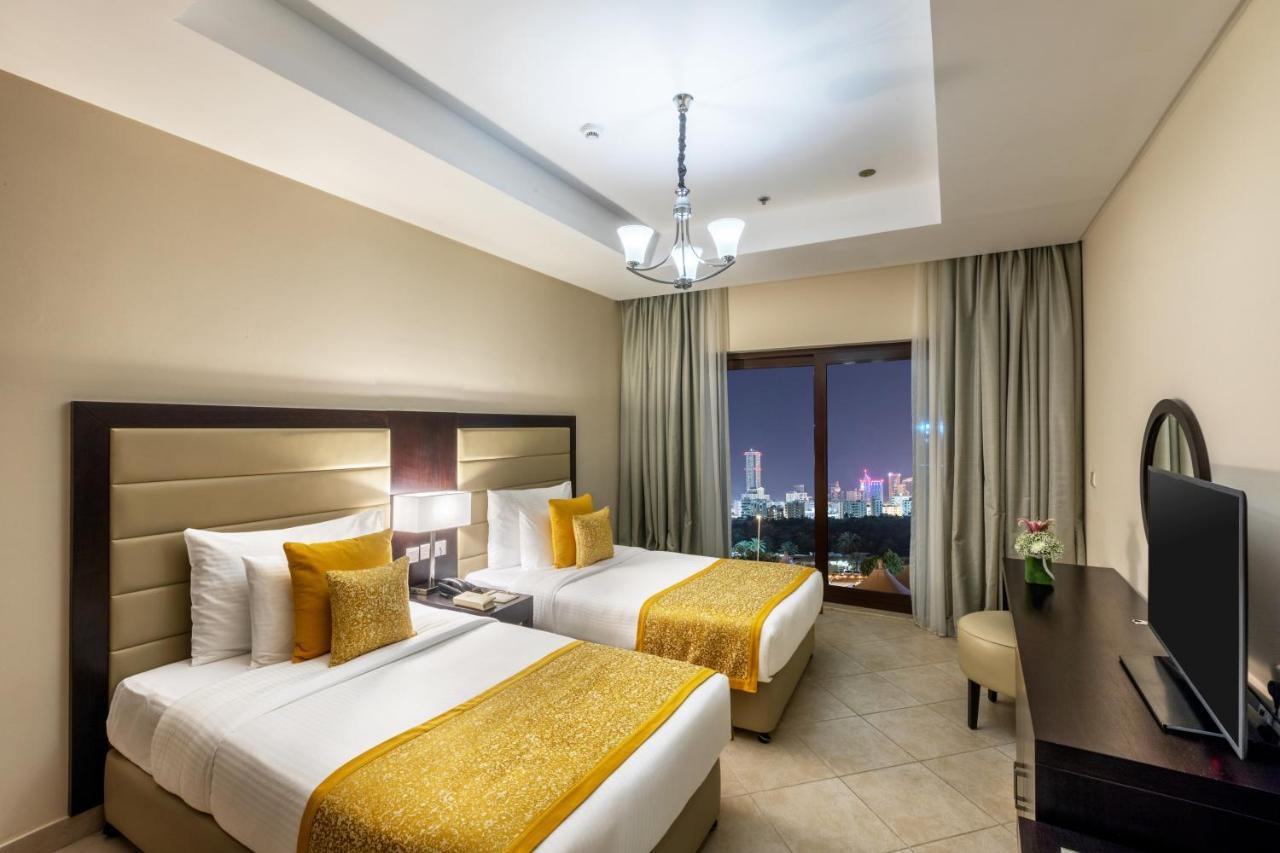 Al Bahar Hotel & Resort Fujairah Exterior photo A bedroom at the hotel