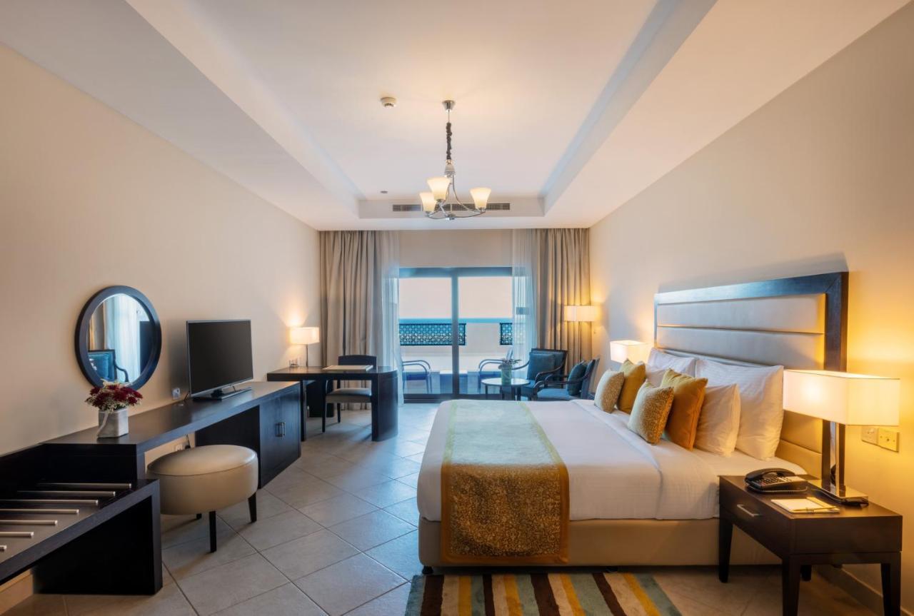 Al Bahar Hotel & Resort Fujairah Exterior photo A bedroom at the hotel