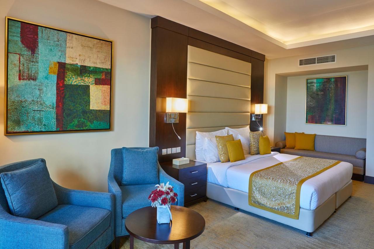 Al Bahar Hotel & Resort Fujairah Exterior photo Deluxe Room