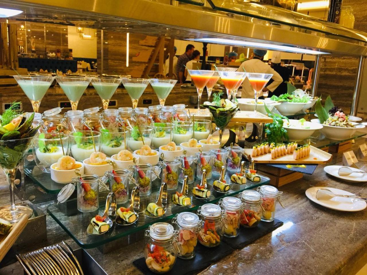 Al Bahar Hotel & Resort Fujairah Exterior photo A salad bar at a buffet