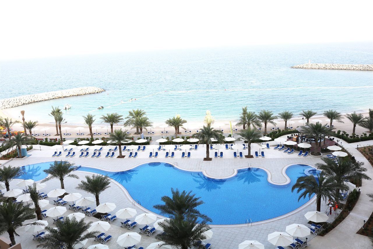 Al Bahar Hotel & Resort Fujairah Exterior photo The pool at the Jumeirah Beach Hotel